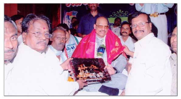 Honouring Sri. T.G. Venkatesh at inaugural function of Girls Hostel, Anantapur, Andhra Pradesh